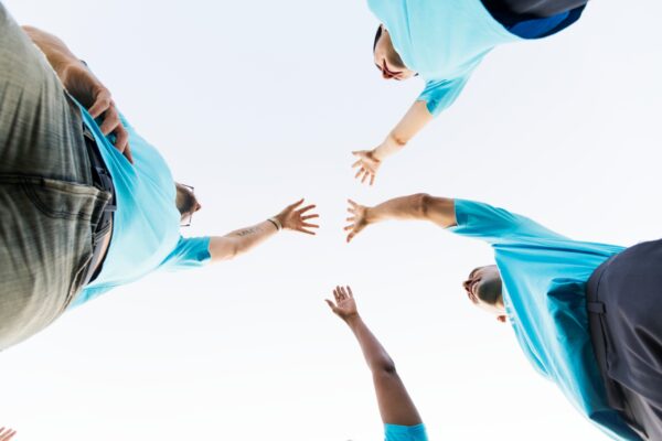 Group of happy and diverse volunteers